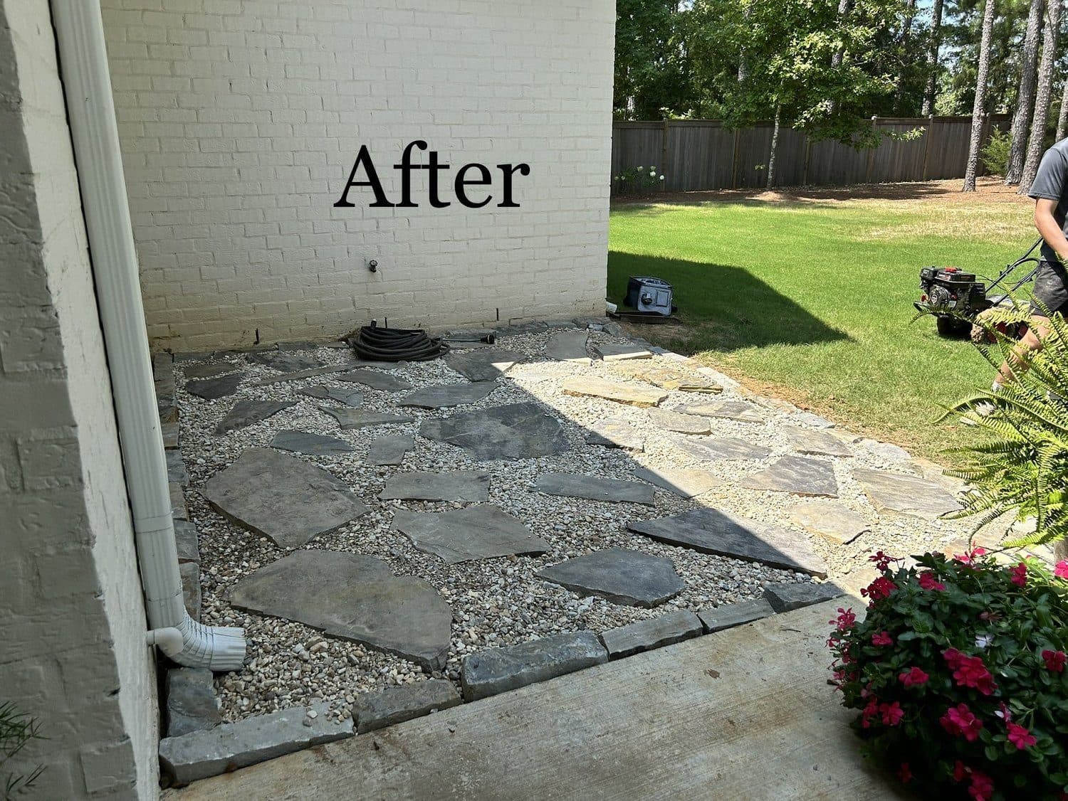 After: flagstone path and gravel in the same corner